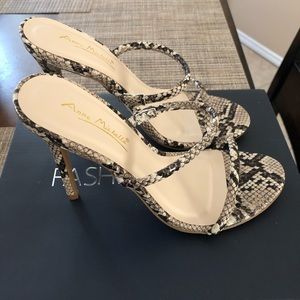 Snakeskin clog heels